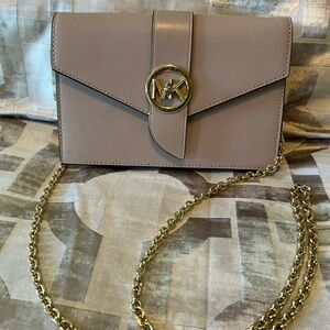 Michael Kors clutch crossbody purse. Great condition.